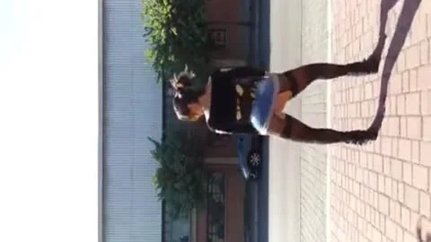Emanuelle Adams receives weenies outside